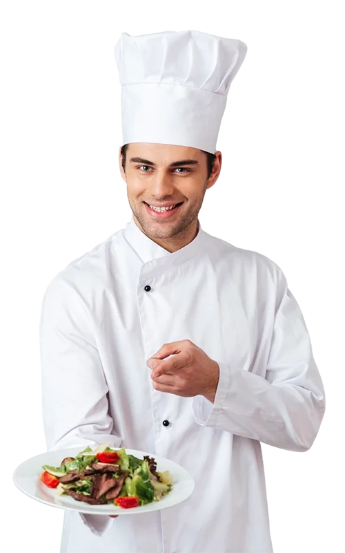 Kucharz technikum gastronomicznego serwuje danie